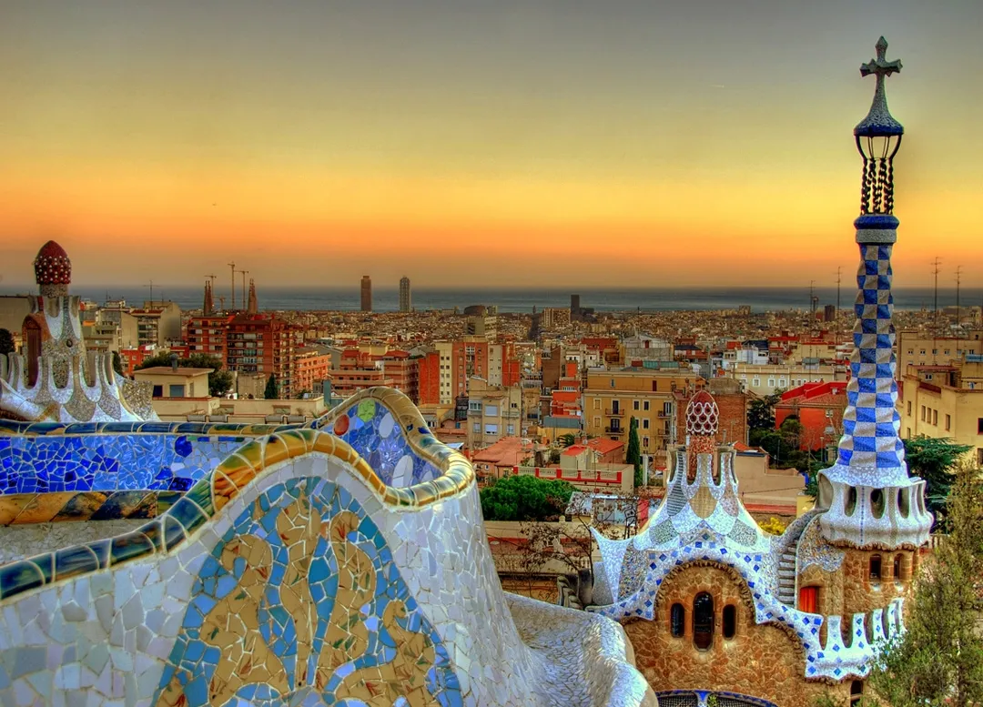 Sunrise illuminating the mosaic benches at Park Güell